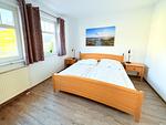 Schlafzimmer - Strandresidenz Juliusruh Fewo 10 - Balkon, 2 SZ - Top-Hundeurlaub