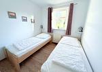 Schlafzimmer - Strandresidenz Juliusruh Fewo 10 - Balkon, 2 SZ - Top-Hundeurlaub