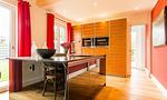 Moderne Küche mit Kochinsel und Holzdetails - Hyggelig Hus - Top-Hundeurlaub