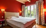 Gemütliches Schlafzimmer mit Fenster und Gartenblick - Hyggelig Hus - Top-Hundeurlaub