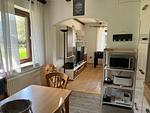 Blick ins Wohnzimmer - Haus 68 Bergblick Fewo 2 unten - Top-Hundeurlaub