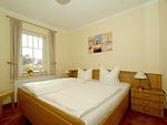 Schlafzimmer mit Doppelbett - Wohnung 11 - Top-Hundeurlaub