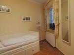 Kleines Schlafzimmer: Bett mit 160x200 Liegefläche - Wohnung 11 - Top-Hundeurlaub