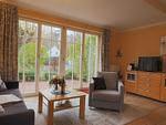 Wohnzimmer mit Blick auf die Terrasse - Wohnung 12 - Top-Hundeurlaub