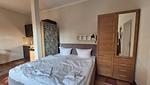 Doppelbett mit Kleiderschrank - Ferienwohnung 22 Ostseenest - Top-Hundeurlaub