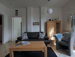 Wohnzimmer mit Schlafsofa - Wohnung 02 - Top-Hundeurlaub