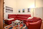 Wohnzimmer mit Sofa - Wohnung 01 direkt am Stadtwald - Top-Hundeurlaub