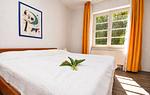 Schlafzimmer - Wohnung 08 - Top-Hundeurlaub