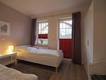 Schlafzimmer mit 2 Einzelbetten - Wohnung 13 - Top-Hundeurlaub