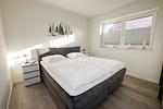 Schlafzimmer - Ferienwohnung "Küstenkind Dorum" Sieltrift 21-14 - Top-Hundeurlaub