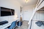 Schlafzimmer 2: Etagenbett (oben: 90x200 - unten:140x200), Xbox-OneX-Konsole - FeWo Auszeit in PRORA - 9.42 - Top-Hundeurlaub