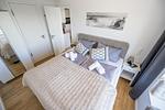 Schlafzimmer 2: Doppelbett (160x200), Kleiderschrank, Smart-TV, Lampe mit eingebautem Ventilator - FeWo Wellenblick in PRORA - 2.53 - Top-Hundeurlaub