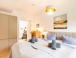 Schlafzimmer 2: Doppelbett (160x200), TV, Kleideschrank - FeWo TREIBsand in PRORA - 2.03 - Top-Hundeurlaub