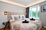 Schlafzimmer 2: Doppelbett (160x200), TV, Kleideschrank - FeWo Unik in PRORA - 8.22 - Top-Hundeurlaub