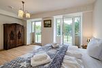 Schlafzimmer 1: 1 Doppelbett (180x200), TV, Zugang zum Balkon - FeWo Ostsee Bernstein in PRORA - 5.01 - Top-Hundeurlaub