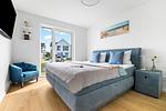 Schlafzimmer - Ferienwohnung Küstentraum Matrosenring - Top-Hundeurlaub