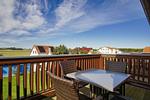 Balkon - Wohnung 03: Balkon, Boddenblick, Sauna- und Schwimmbadnutzung - Top-Hundeurlaub