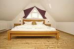 Schlafzimmer - Wohnung 03: Balkon, Boddenblick, Sauna- und Schwimmbadnutzung - Top-Hundeurlaub