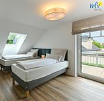 Schlafzimmer - Ferienwohnung Watt'n Platz - Top-Hundeurlaub