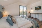 Schlafzimmer - Ferienhaus "Haffhus" mit Balkon, Terrasse und 2 Bädern - Top-Hundeurlaub