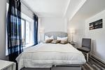 Schlafzimmer 1: Doppelbett (180x200), TV - FeWo Hygge in PRORA - 6.02 - Top-Hundeurlaub