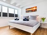 Schlafzimmer 2: Doppelbett (180x200), TV - FeWo Dünenheide 3.4 in PRORA - 7.34 - Top-Hundeurlaub