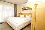 Schlafzimmer - Bungalow Hanseatchen: Terrasse - Top-Hundeurlaub
