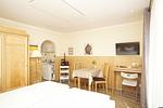Wohnzimmer - Bungalow Hanseatchen: Terrasse - Top-Hundeurlaub