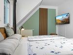 Schlafzimmer - Haus Neptun - Top-Hundeurlaub