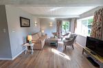 Wohnzimmer - Ferienhaus Fjord Cottage Steinbergkirche - Top-Hundeurlaub
