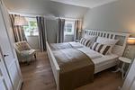 Schlafzimmer - Ferienhaus Fjord Cottage Steinbergkirche - Top-Hundeurlaub