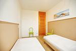 Blick ins 2. Schlafzimmer mit Einbauschrank - Wohnung 128 - Top-Hundeurlaub