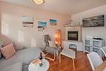 Wohnzimmer - Ferienwohnung Strandbrise mit Kamin und Balkon - Top-Hundeurlaub