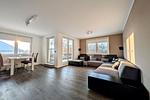 Wohnzimmer mit Blick zum Balkon - Wohnung 20 - Top-Hundeurlaub