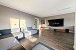 Wohnzimmer mit Blick auf Fernseher - Wohnung 20 - Top-Hundeurlaub