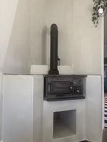 Schlanker Kaminofen im Ferienhaus Ryd für gemütliche Wärme - Familienhaus Ryd - Top-Hundeurlaub