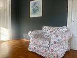 Gemütlicher Sessel im Wohnzimmer des Ferienhauses Ryd in Småland - Familienhaus Ryd - Top-Hundeurlaub