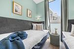 Schlafzimmer - Ferienwohnung "OstseeLounge" Priwall Travemünde - Top-Hundeurlaub