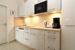Küche / Küchenzeile - Appartementanlage Strandjuwel Fewo 227 - Top-Hundeurlaub