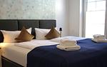 Schlafzimmer - Bernstein Suite & Breakfast Apartment 02 - Top-Hundeurlaub