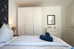 Schlafzimmer - Bernstein Suite & Breakfast Apartment 04 - Top-Hundeurlaub