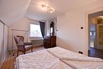 Schlafzimmer - Haus "Küstenzauber" - Top-Hundeurlaub