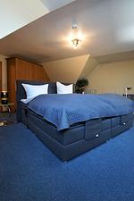 Schlafzimmer - Wohnung 6/5 - Top-Hundeurlaub