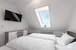 Haus Welle, Whg. Kuschelnest Schlafzimmer mit TV - Ferienwohnung Haus Welle, Apartment Kuschelnest - Top-Hundeurlaub