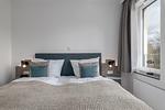 Schlafzimmer - Westside Arthotel Apartment 121 - Top-Hundeurlaub