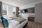 Schlafzimmer - Westside Arthotel Apartment 120 - Top-Hundeurlaub