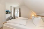 Schlafzimmer - Ferienpark Seepferdchen, Haus Usedom 1a - Top-Hundeurlaub
