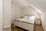 Schlafzimmer - Ferienpark Seepferdchen, Haus Usedom 1a - Top-Hundeurlaub