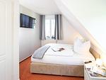 Schlafzimmer - Ferienpark Seepferdchen, Haus Zingst 16a - Top-Hundeurlaub