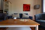Wohnzimmer - Ferienpark Seepferdchen, Haus Hiddensee 13c - Top-Hundeurlaub